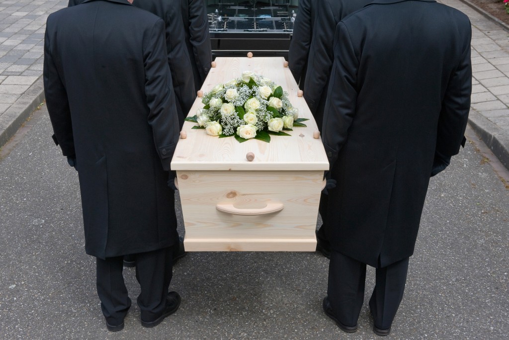 carrying a casket