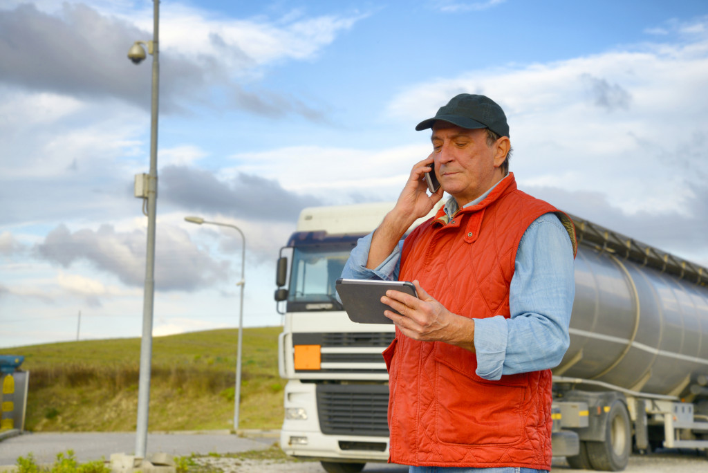 A truck driver contacting family during transport