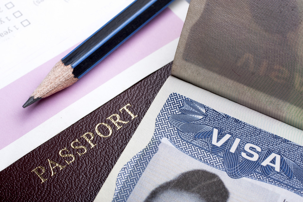 Passport and visa and pencil